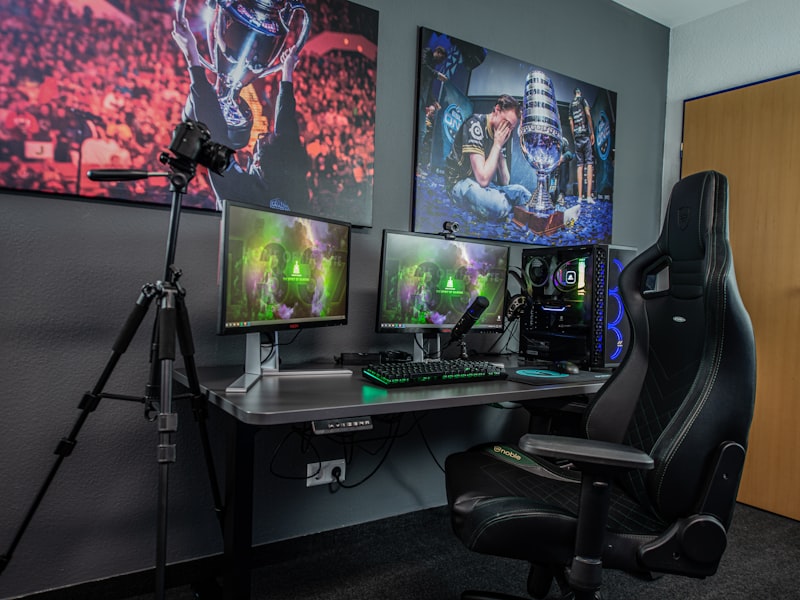 Studio workspace with retro consoles and pixel art on screens